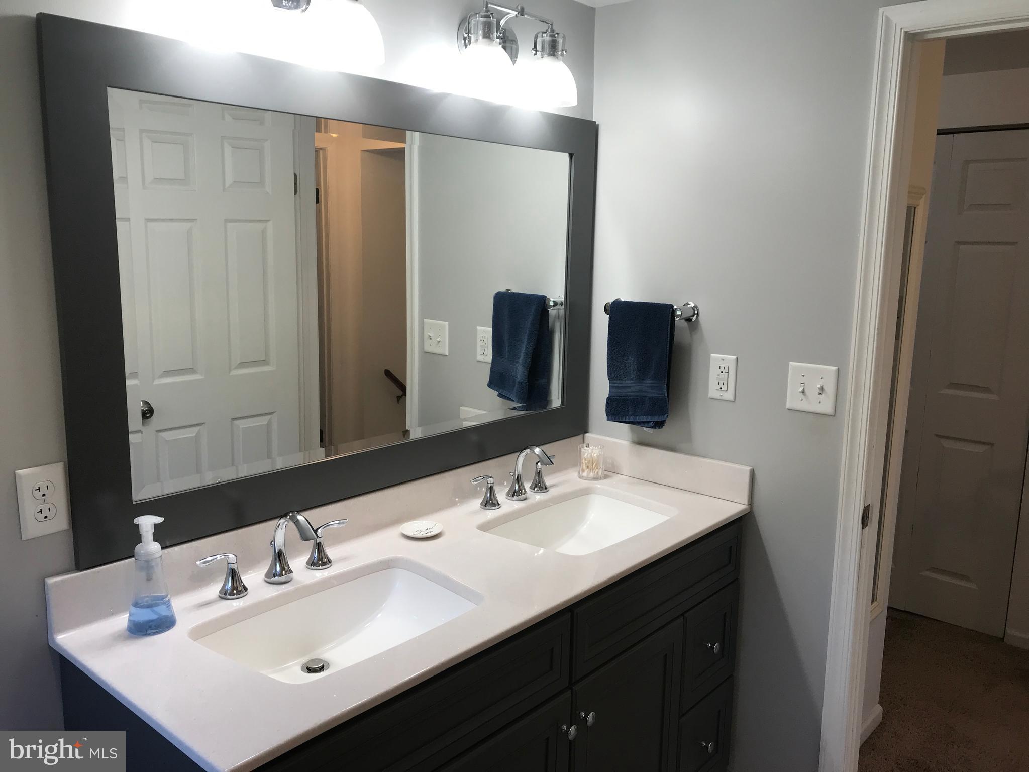 195 River Road Pequea, PA 17565 - Photo 46 of 77 a bathroom with a sink and a mirror