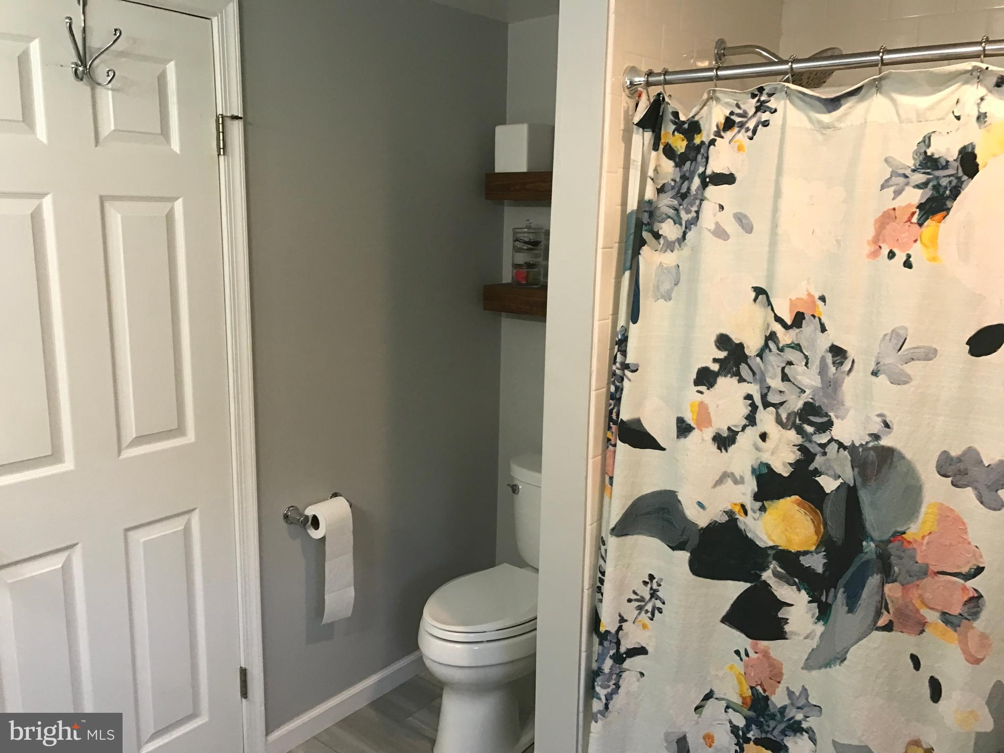 195 River Road Pequea, PA 17565 - Photo 48 of 77 a white toilet sitting next to a bathroom sink