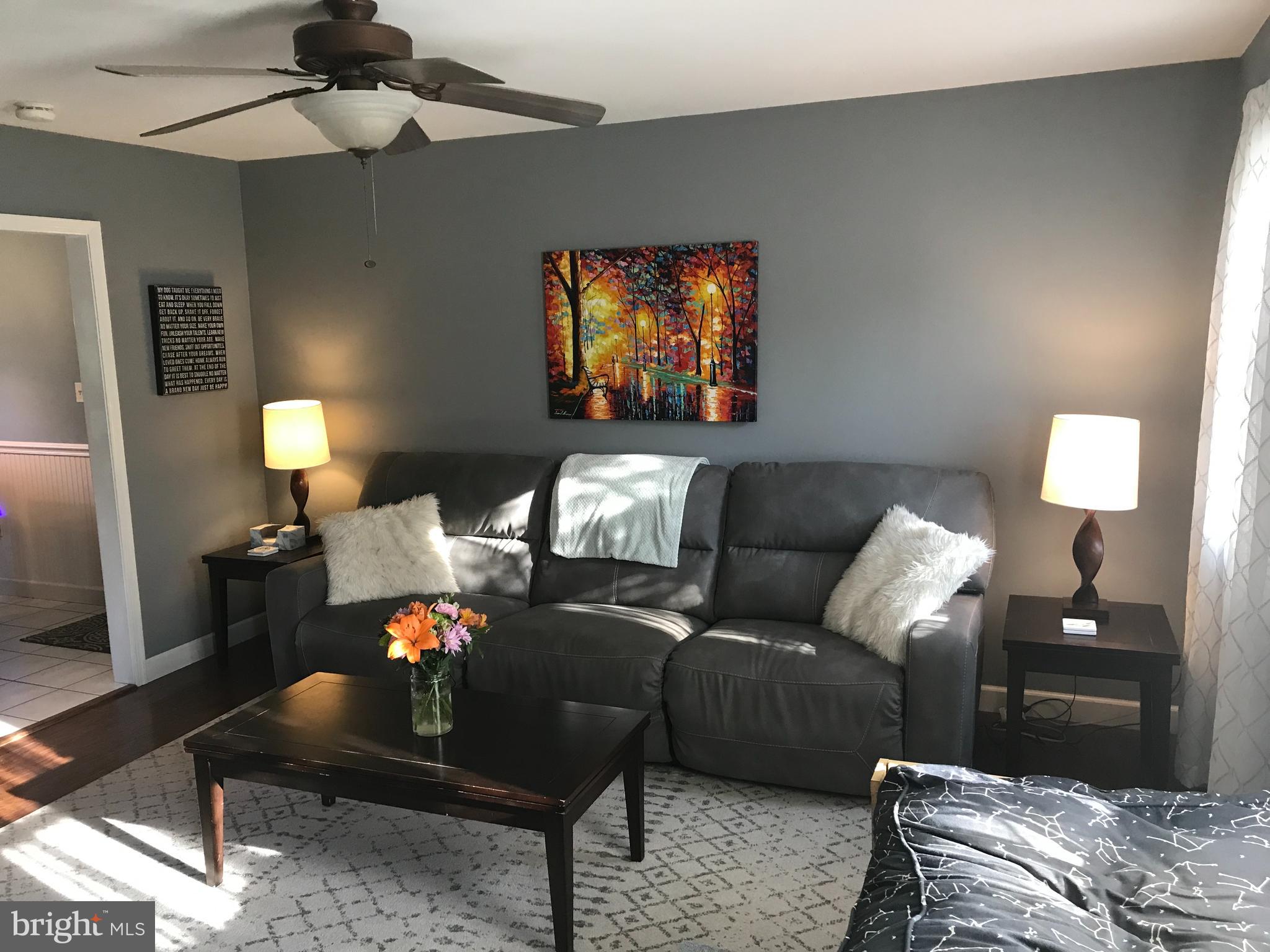 195 River Road Pequea, PA 17565 - Photo 7 of 77 a living room with furniture and a chandelier