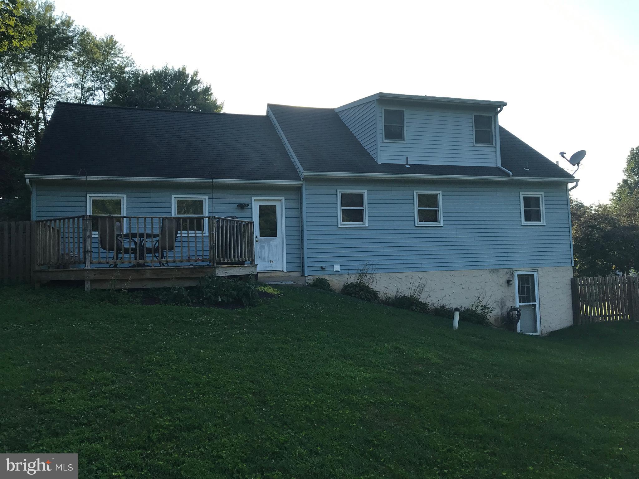 195 River Road Pequea, PA 17565 - Photo 76 of 77 a brick house with a yard fire pit