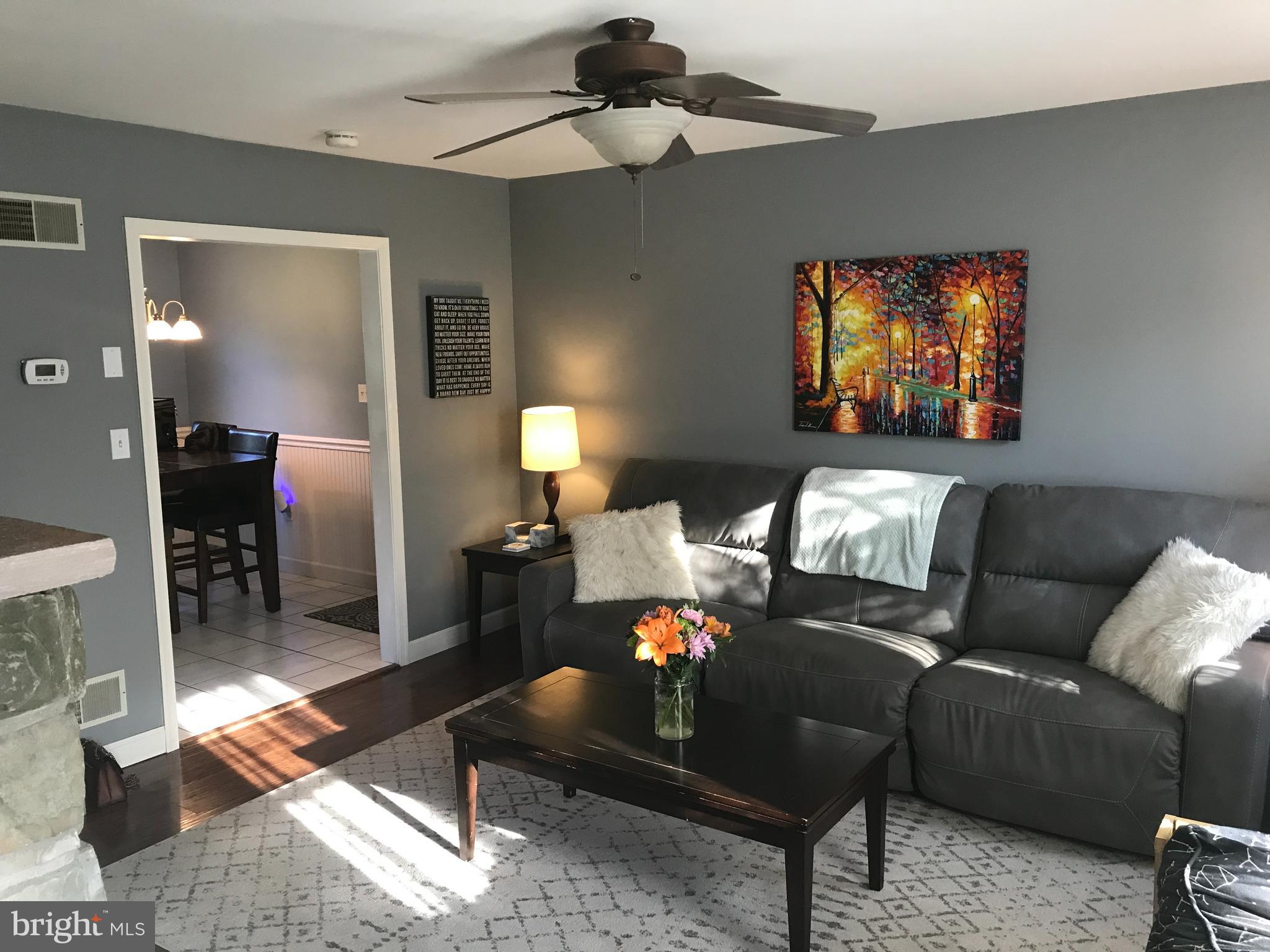 195 River Road Pequea, PA 17565 - Photo 8 of 77 a living room with furniture a lamp and a window