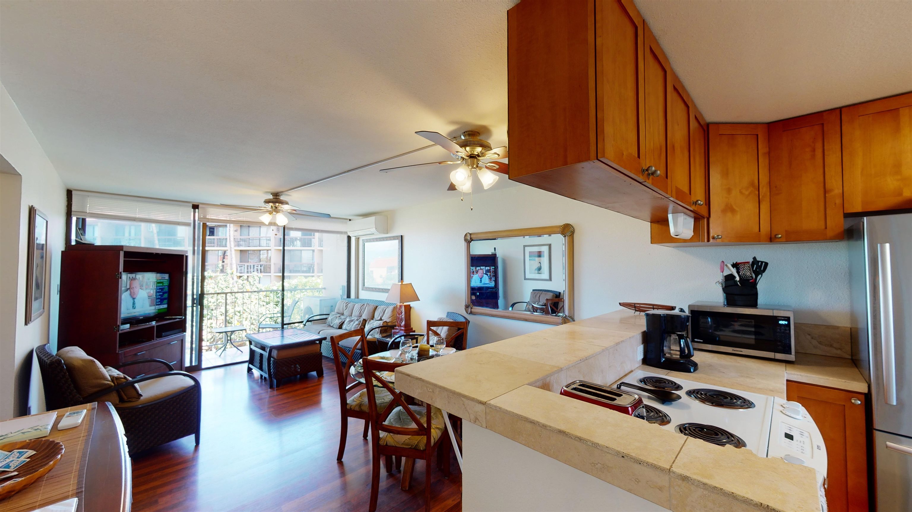 2219 South Kihei Road, Unit A408 Kihei, HI 96753 - Photo 16 of 30 a view of a dining room with furniture window and outside view