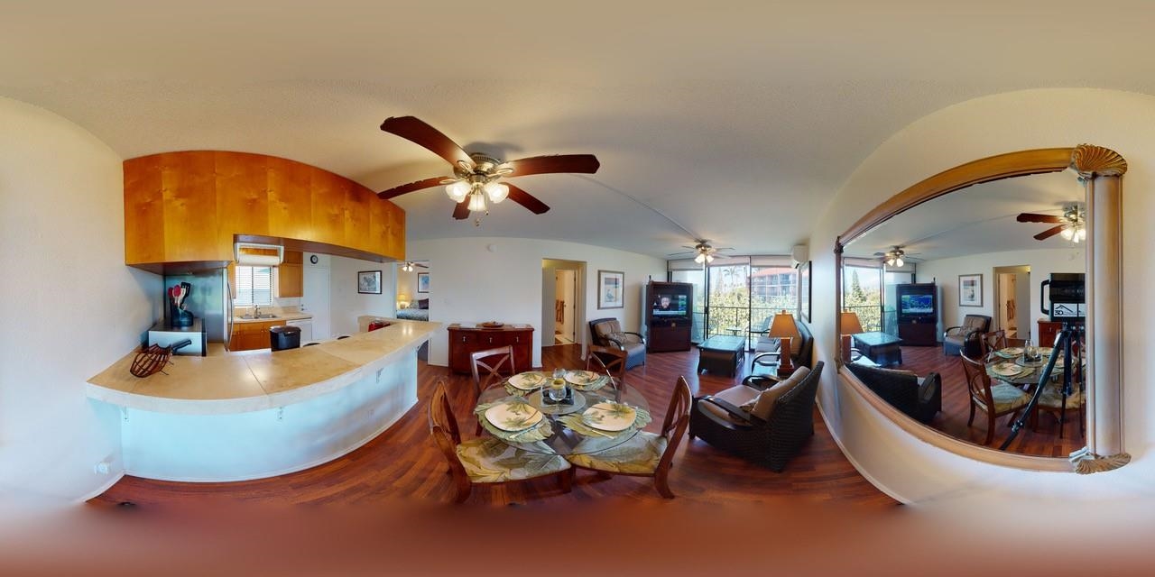2219 South Kihei Road, Unit A408 Kihei, HI 96753 - Photo 2 of 30 a living room with fireplace furniture and a large window