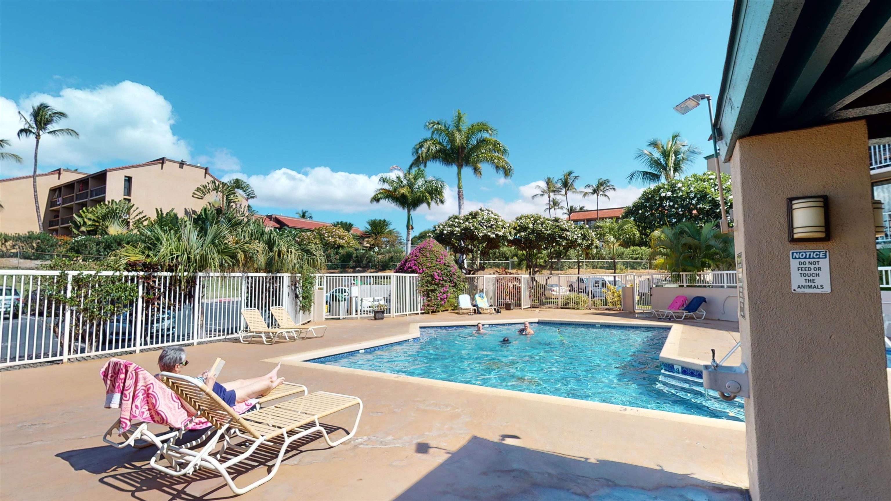 2219 South Kihei Road, Unit A408 Kihei, HI 96753 - Photo 29 of 30 a view of a swimming pool with a patio