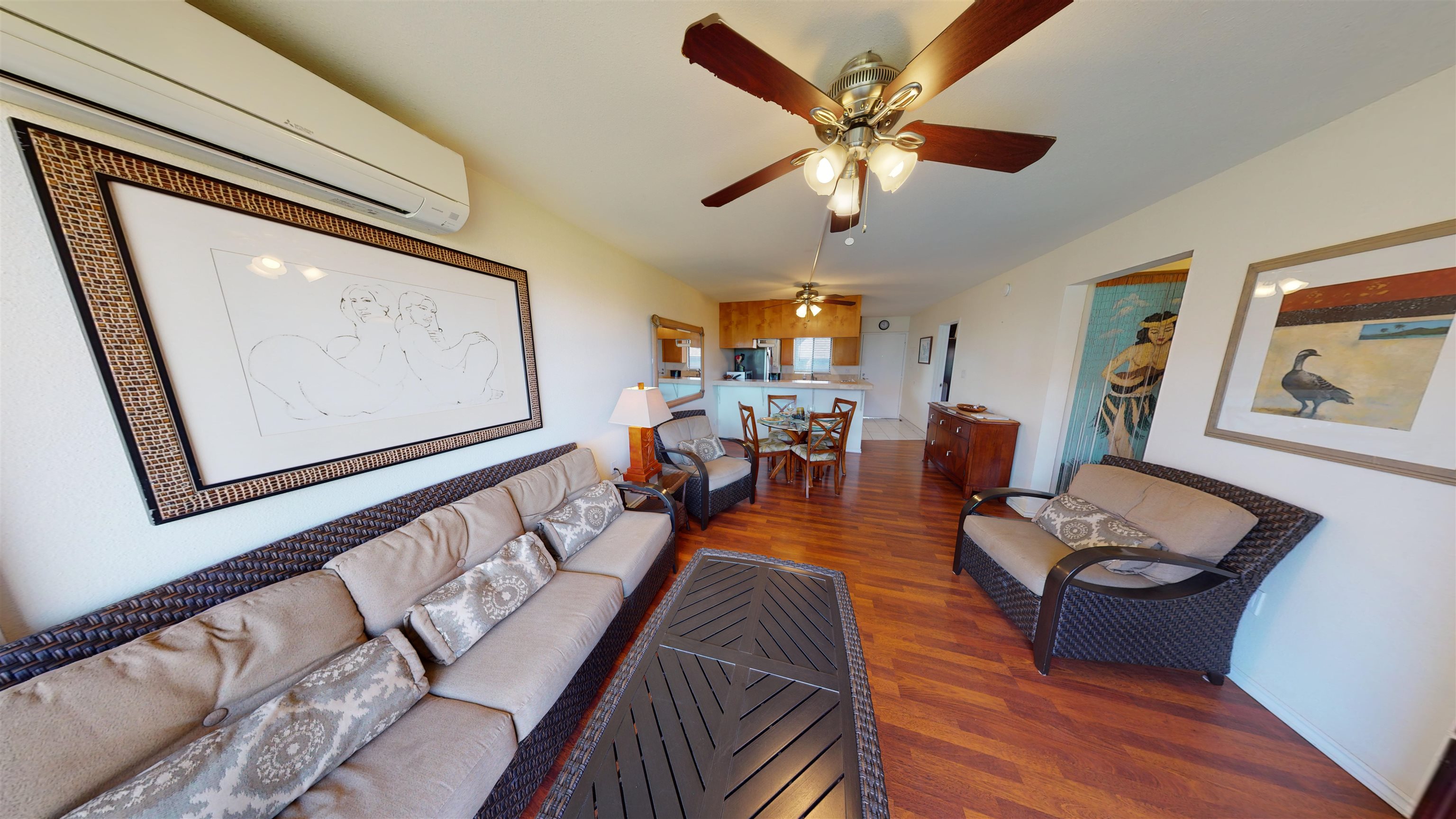 2219 South Kihei Road, Unit A408 Kihei, HI 96753 - Photo 8 of 30 a living room with furniture and wooden floor
