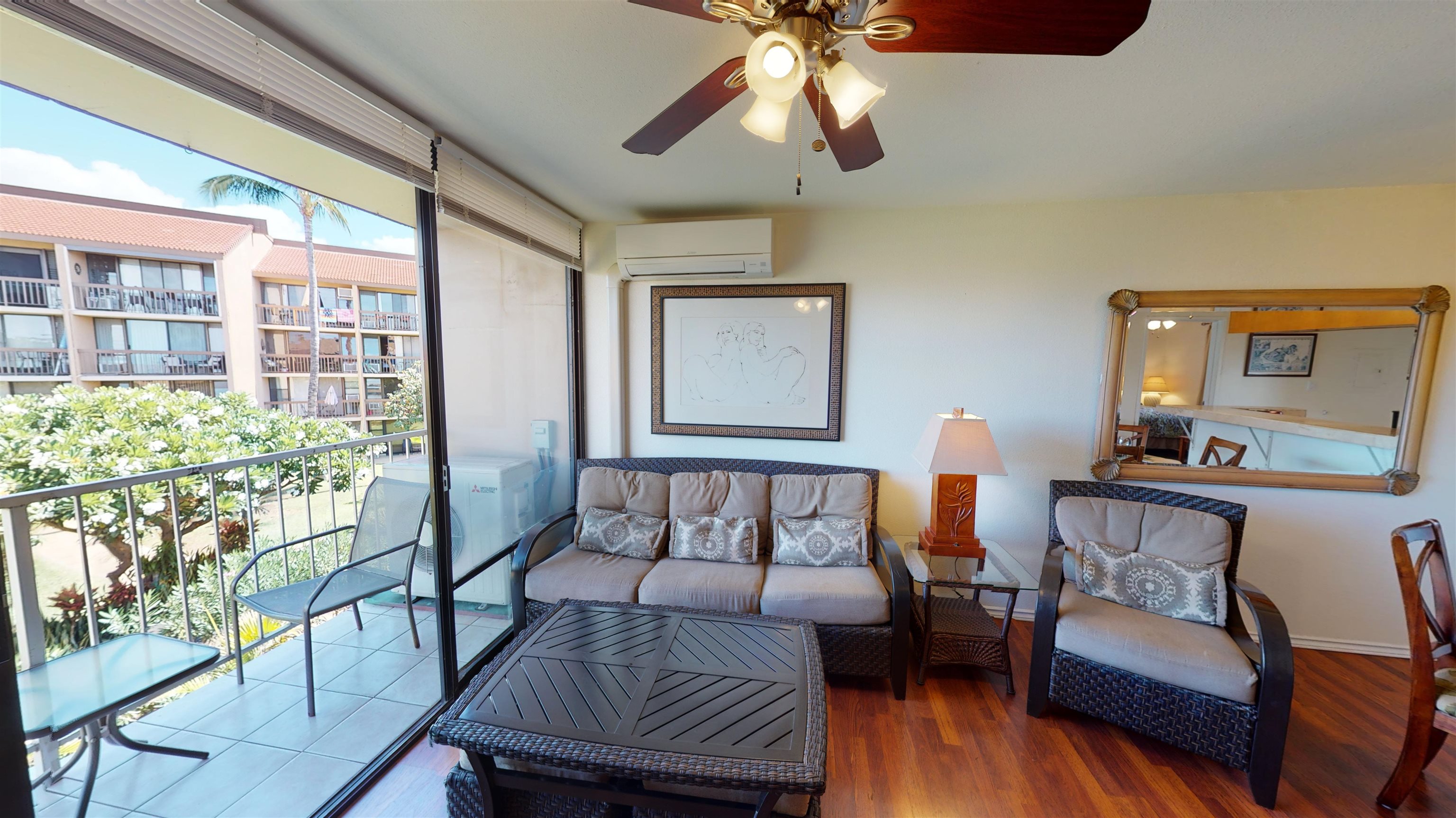 2219 South Kihei Road, Unit A408 Kihei, HI 96753 - Photo 9 of 30 a bedroom with furniture and a large window