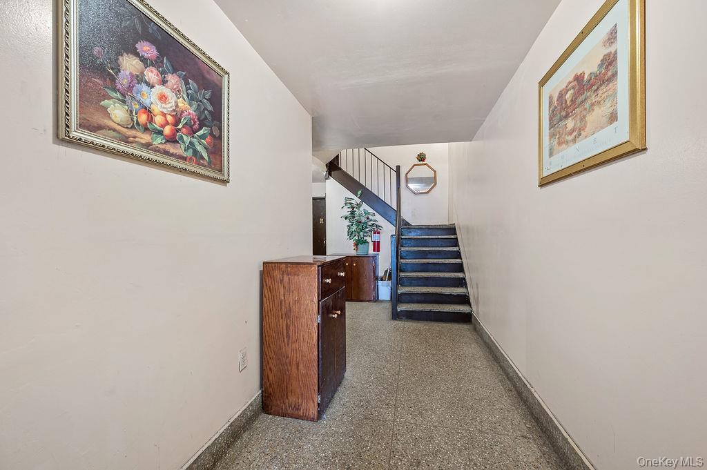 41-30 45th Street Queens, NY 11104 - Photo 7 of 16 a view of a hallway with stairs