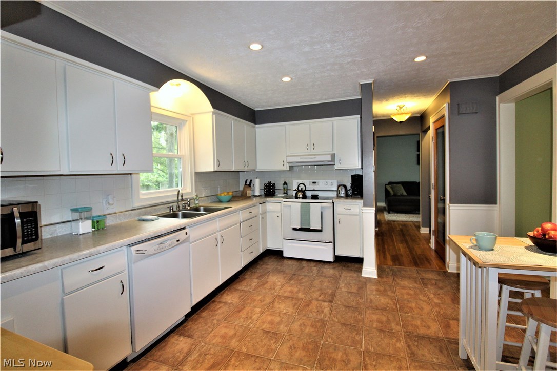 2887 Lee Road Silver Lake, OH 44224 - Photo 6 of 24 Kitchen with an Abundance of Cabinetry & Counter Space