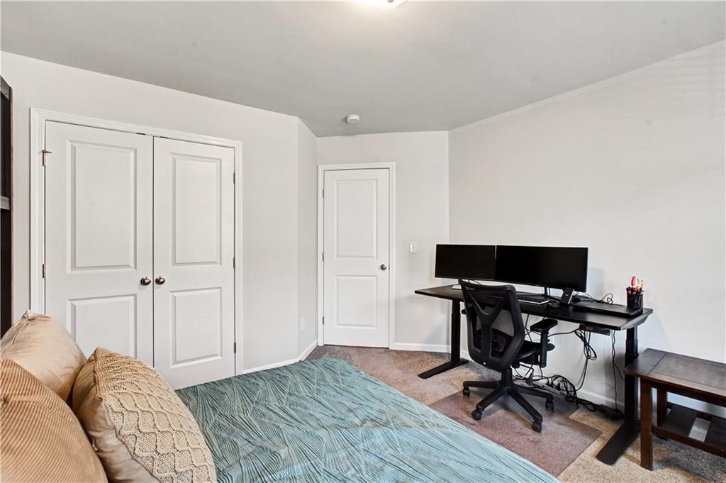 3434 Senna Road Duluth, GA 30096 - Photo 33 of 39 a view of a livingroom with workspace and a window