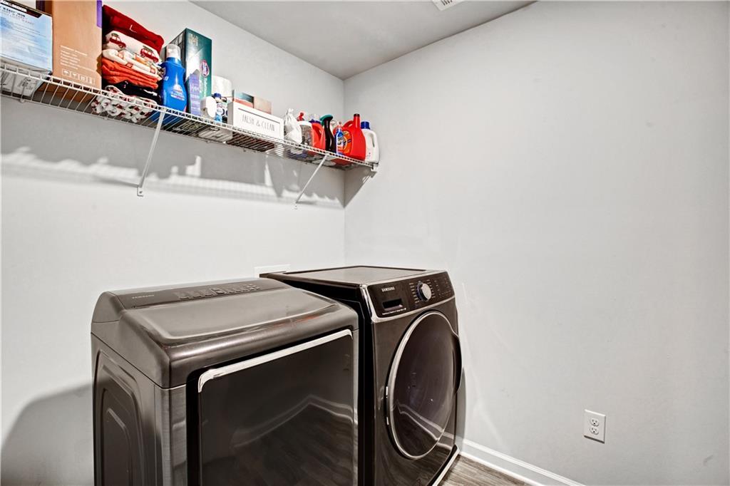 3434 Senna Road Duluth, GA 30096 - Photo 36 of 39 a utility room with dryer and washer