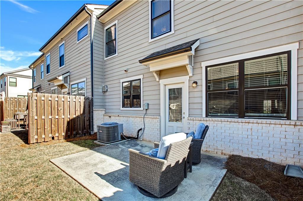 3434 Senna Road Duluth, GA 30096 - Photo 38 of 39 a backyard of a house with sofas
