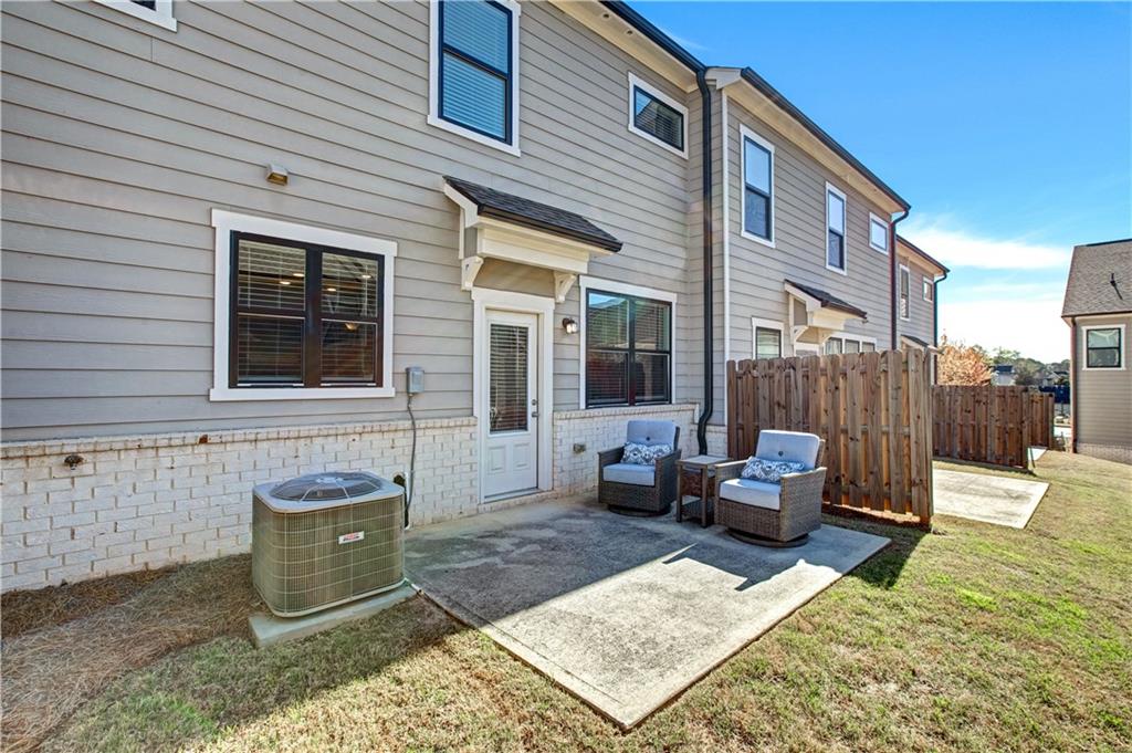 3434 Senna Road Duluth, GA 30096 - Photo 39 of 39 a backyard of a house with seating space