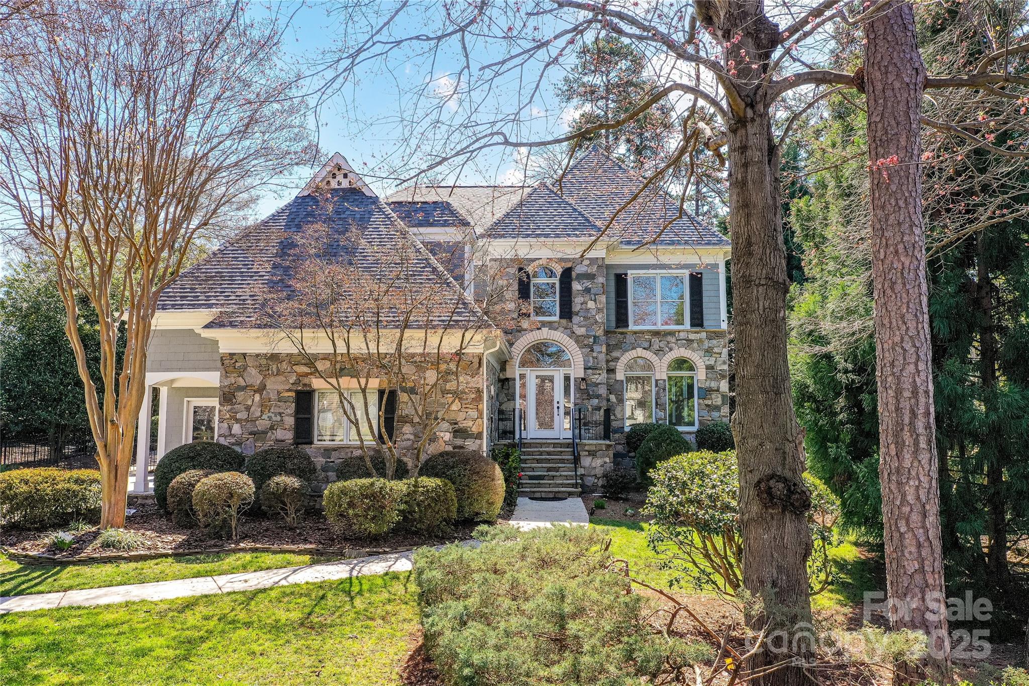 18512 Square Sail Road Cornelius, NC 28031 - Photo 1 of 40 a view of a house with a yard patio and fire pit