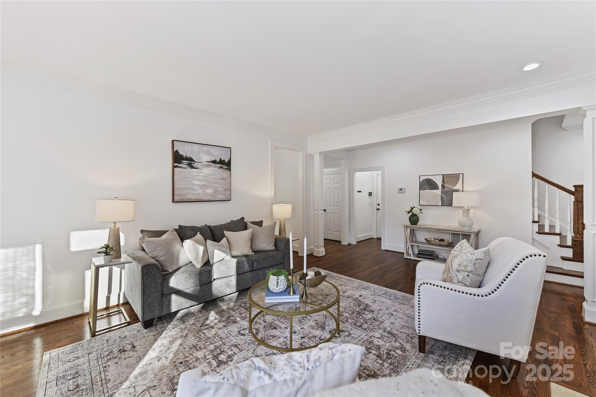 18512 Square Sail Road Cornelius, NC 28031 - Photo 13 of 40 a living room with furniture or couch and a wooden floor