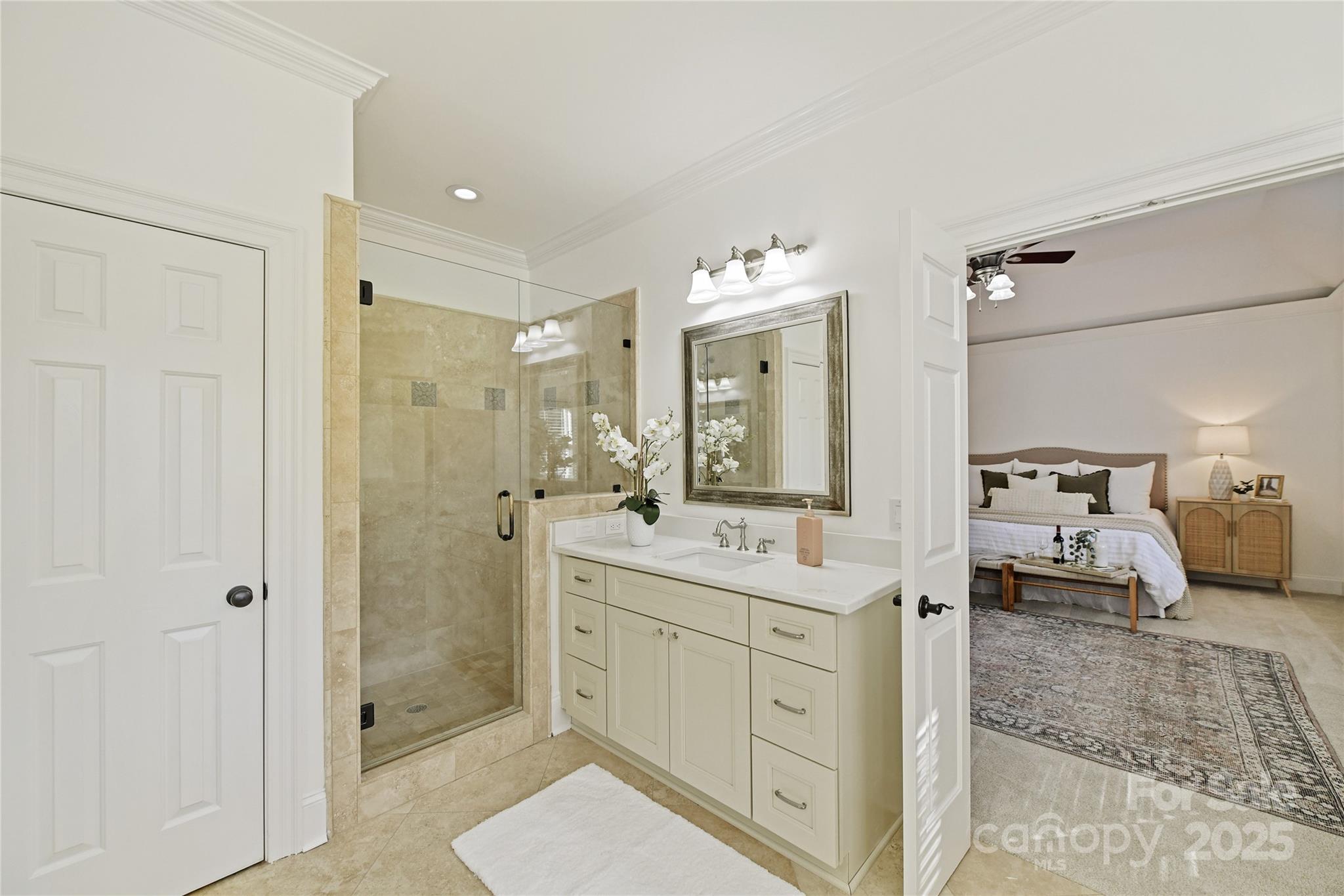 18512 Square Sail Road Cornelius, NC 28031 - Photo 26 of 40 a spacious bathroom with a double vanity sink mirror and shower