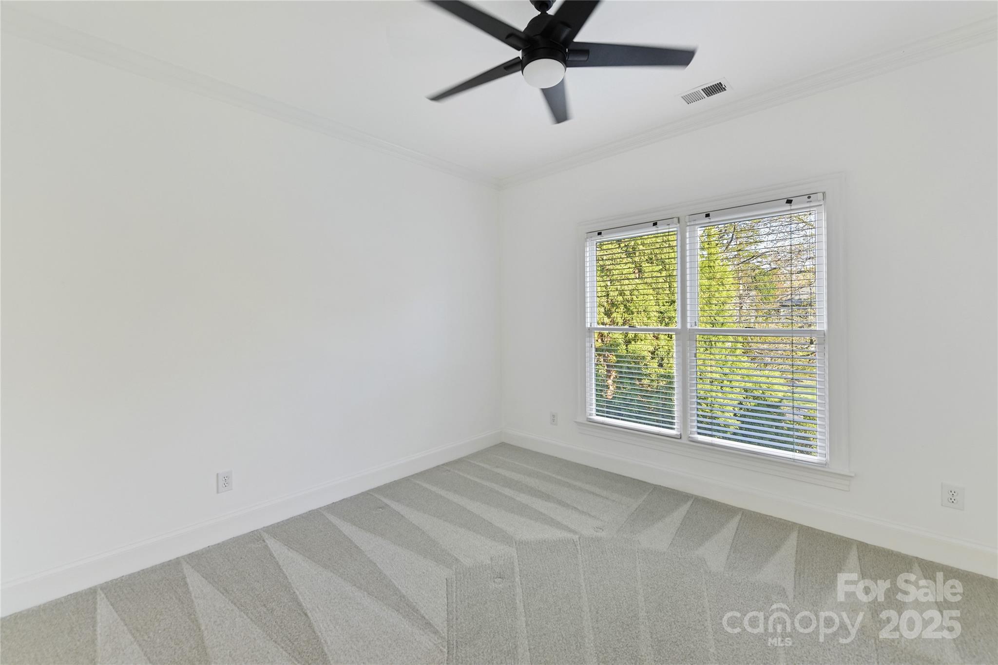 18512 Square Sail Road Cornelius, NC 28031 - Photo 29 of 40 a view of an empty room with a window