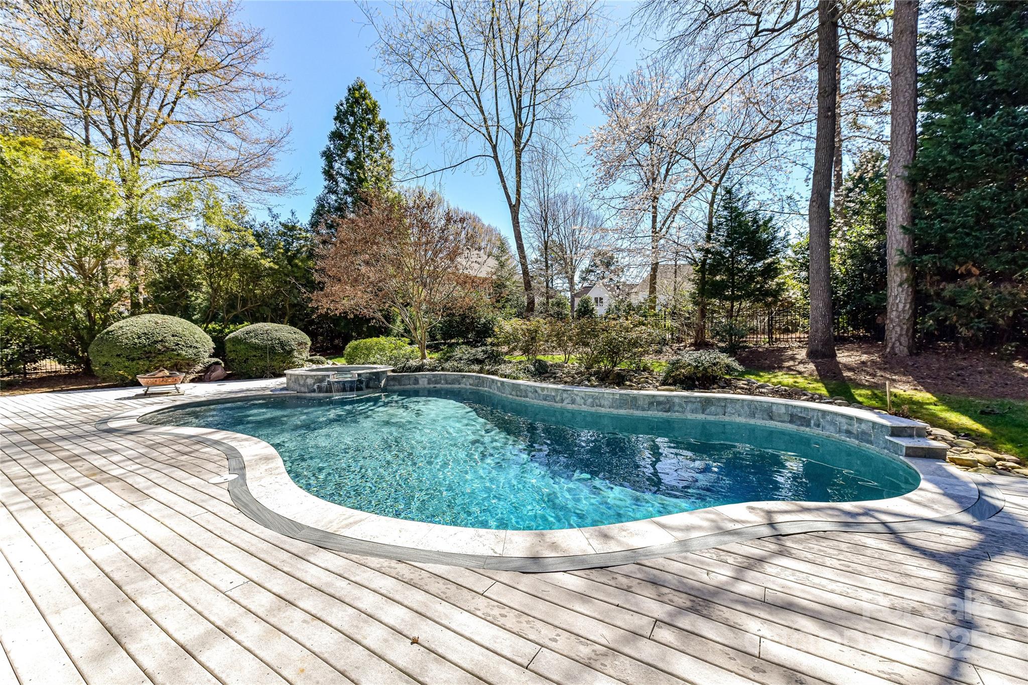 18512 Square Sail Road Cornelius, NC 28031 - Photo 37 of 40 a view of a swimming pool with a patio