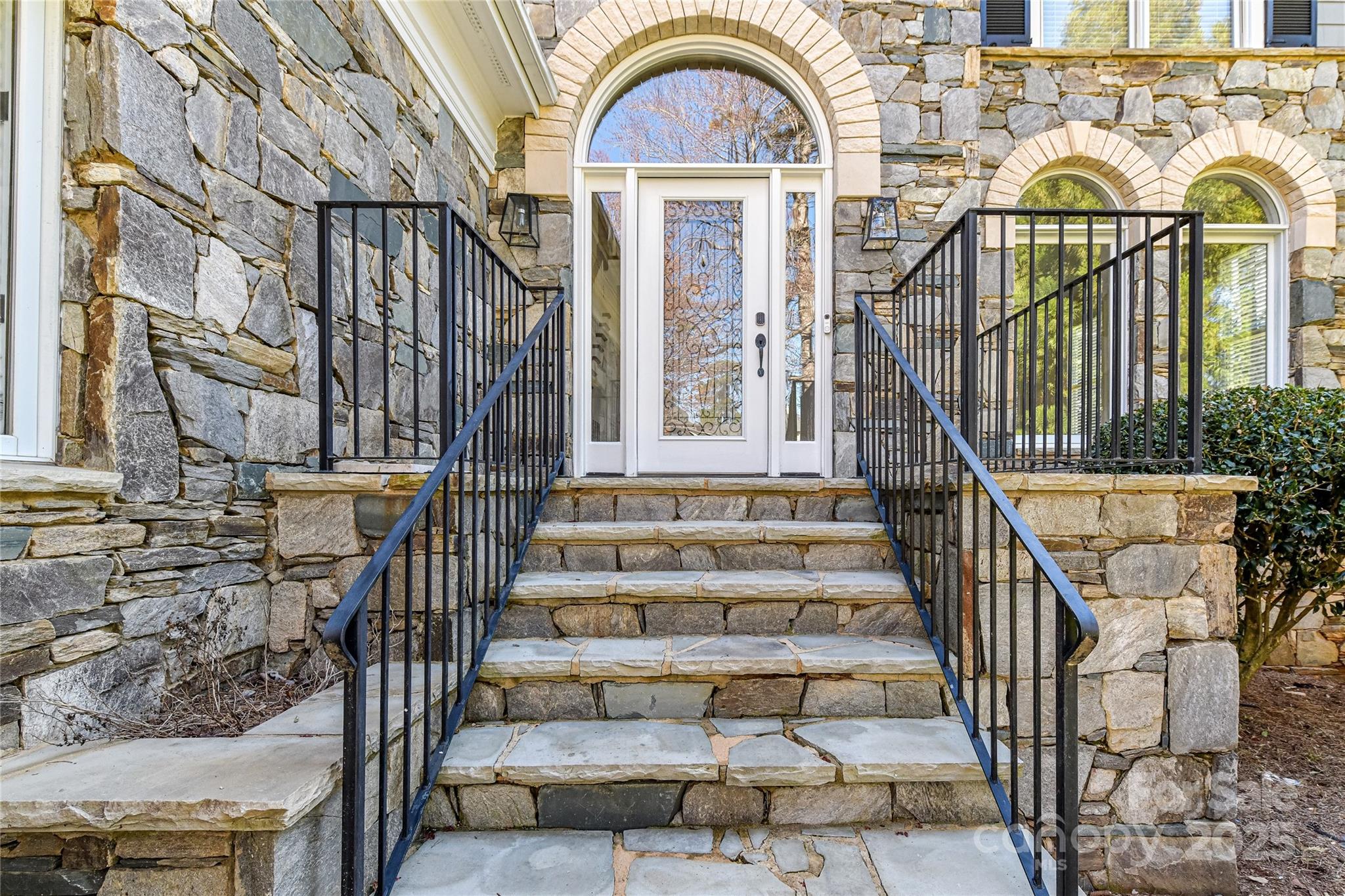 18512 Square Sail Road Cornelius, NC 28031 - Photo 4 of 40 a view of entryway with a front door