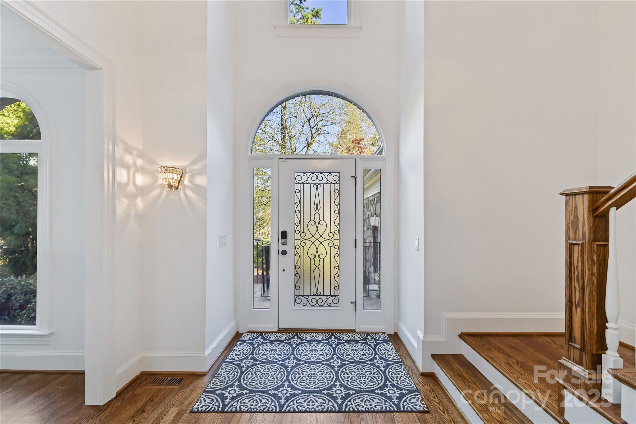 18512 Square Sail Road Cornelius, NC 28031 - Photo 5 of 40 a view of an entryway with wooden floor