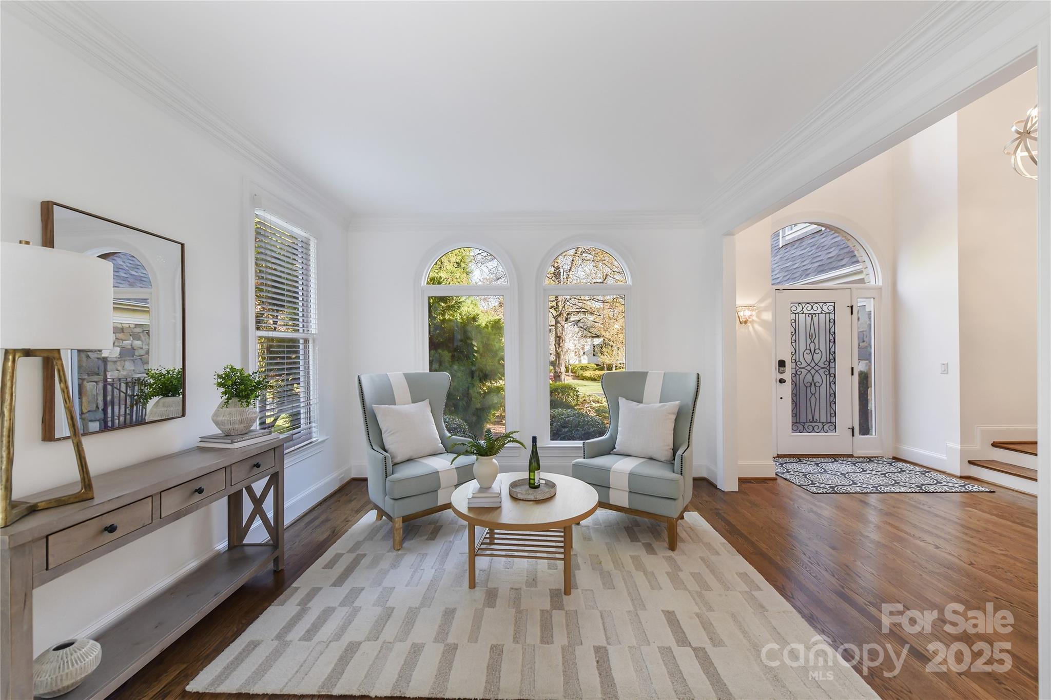 18512 Square Sail Road Cornelius, NC 28031 - Photo 8 of 40 a living room with furniture and wooden floor