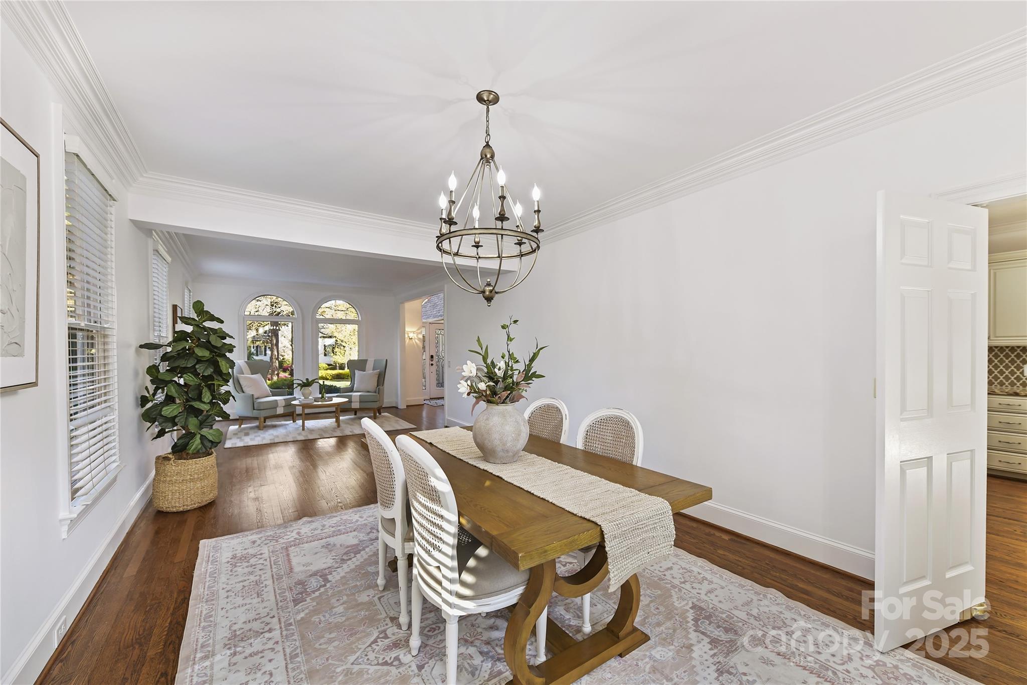 18512 Square Sail Road Cornelius, NC 28031 - Photo 9 of 40 a view of a dining room with furniture and chandelier