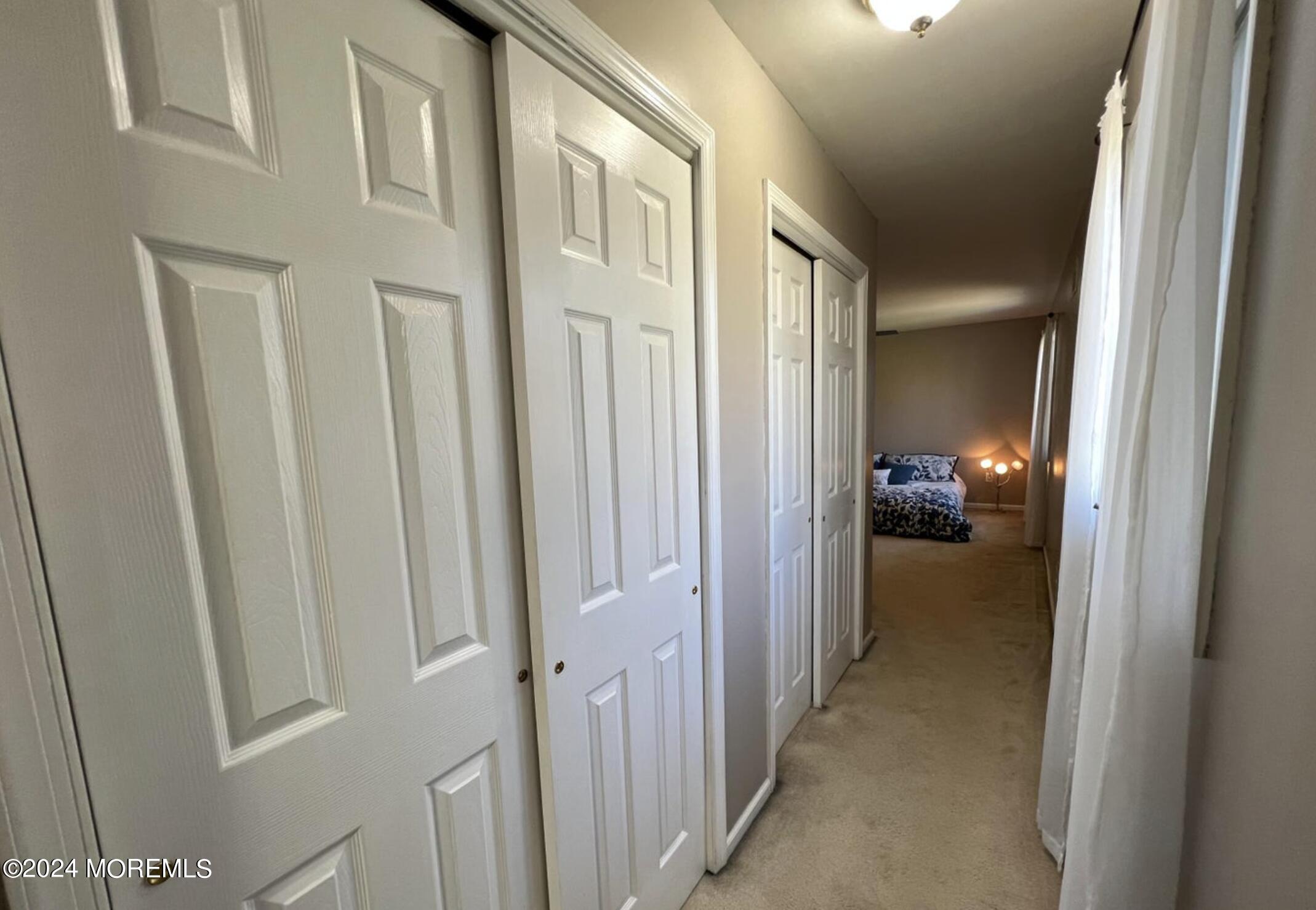 404 Drum Point Road Brick, NJ 08723 - Photo 14 of 22 a view of a livingroom and a bathroom