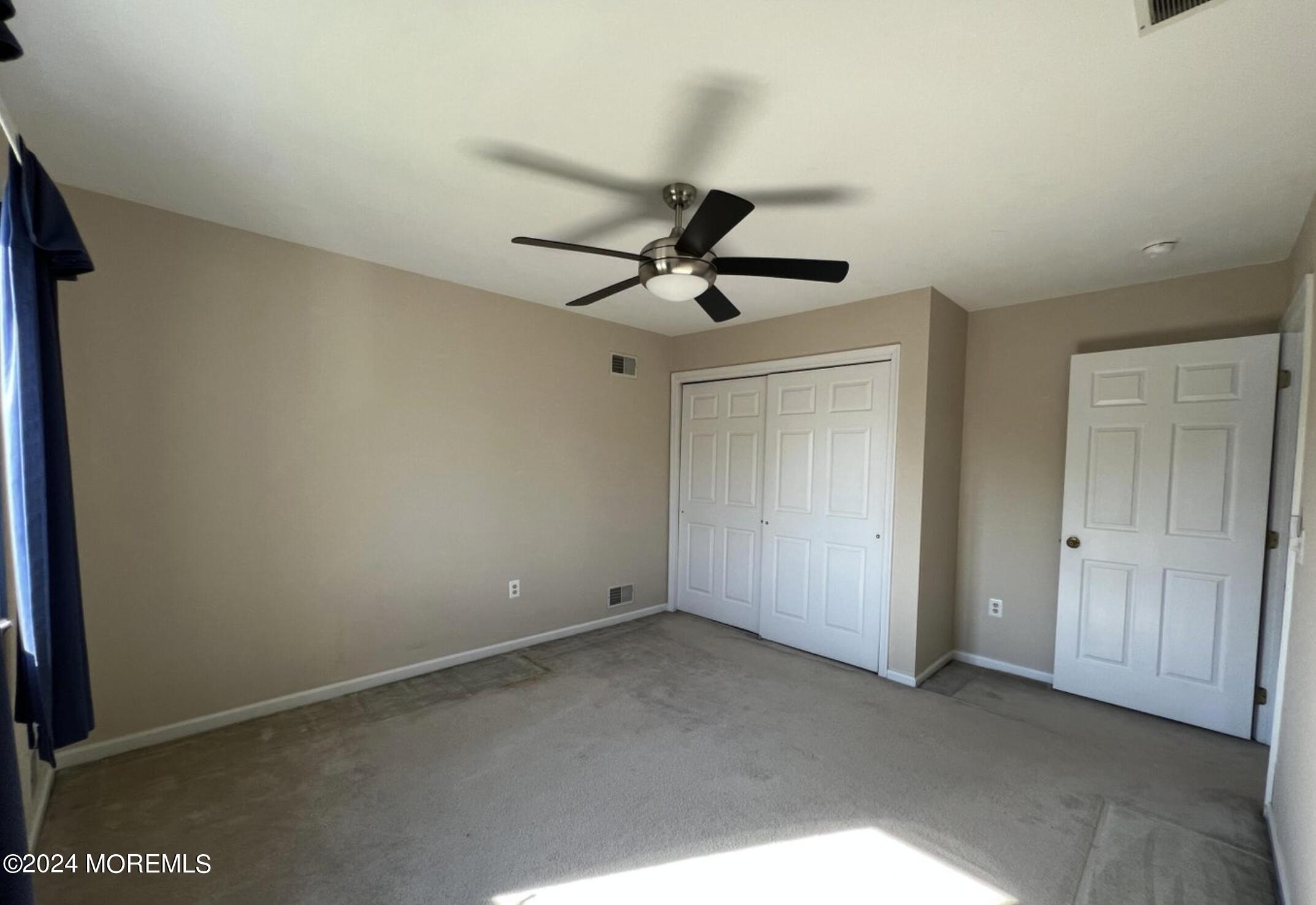 404 Drum Point Road Brick, NJ 08723 - Photo 18 of 22 a view of room with ceiling fan