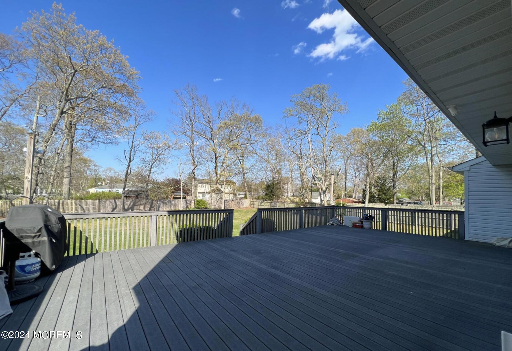 404 Drum Point Road Brick, NJ 08723 - Photo 21 of 22 a view of house with deck and outdoor space