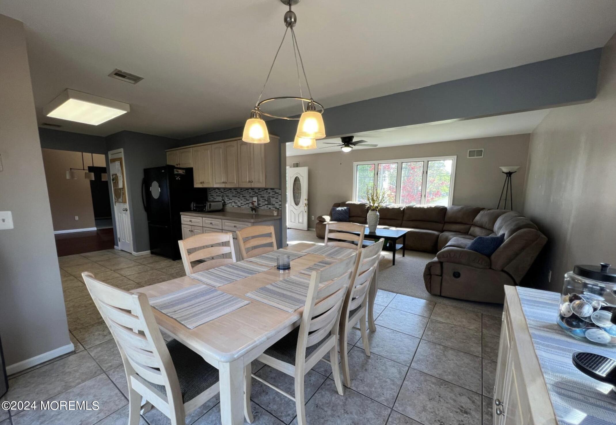 404 Drum Point Road Brick, NJ 08723 - Photo 5 of 22 a view of a dining room with furniture