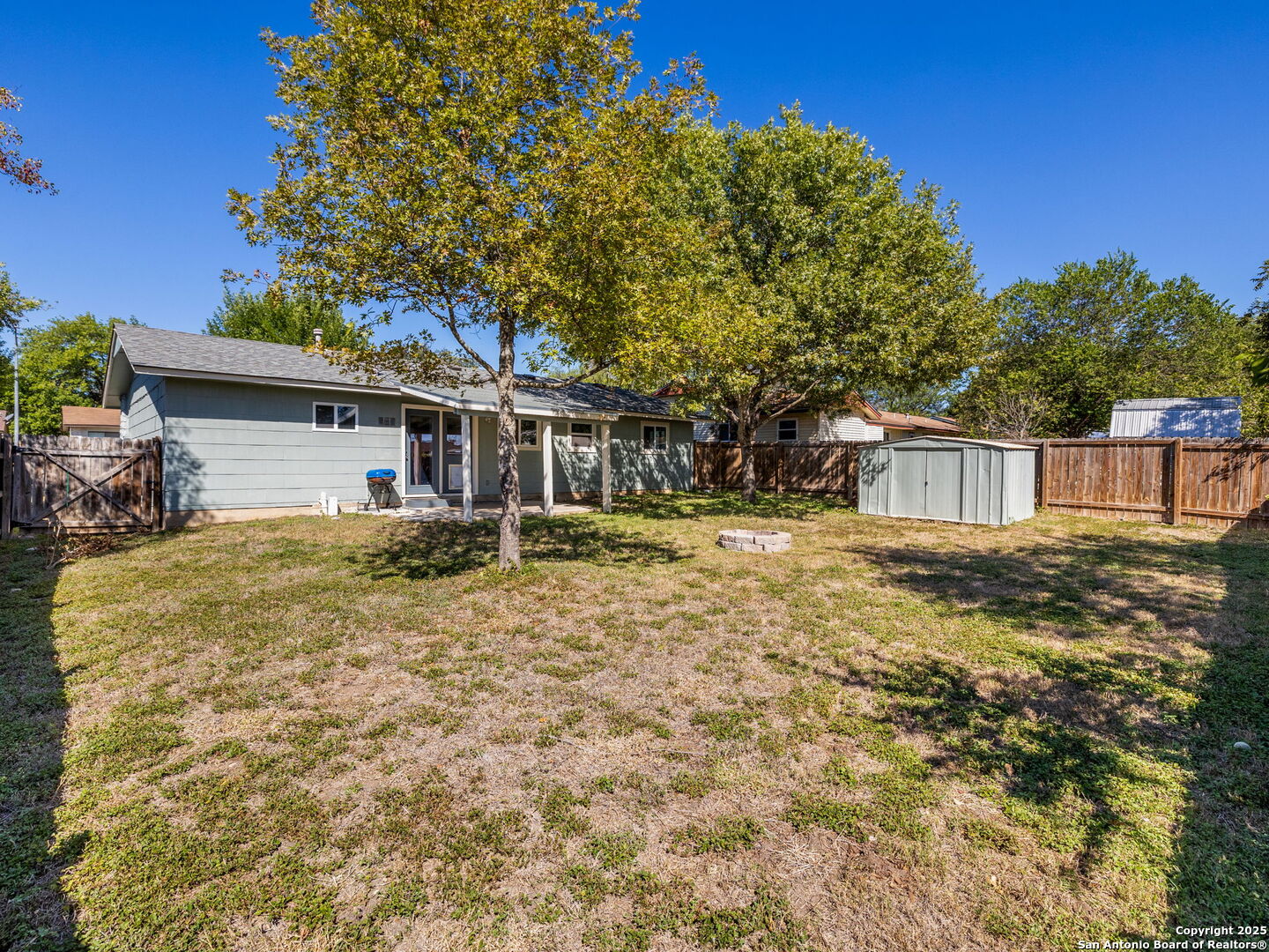 422 Bridgit Drive Converse, TX 78109 - Photo 15 of 17 a front view of a house with a yard