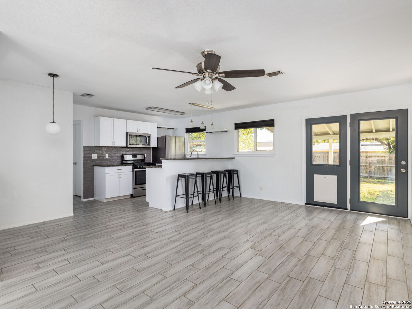 422 Bridgit Drive Converse, TX 78109 - Photo 4 of 17 a view of kitchen with furniture and window
