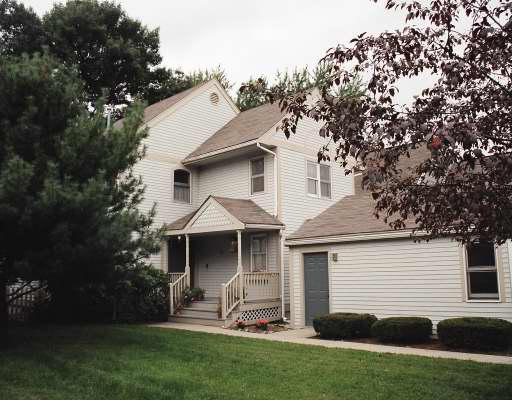 12 Rebecca Road Newton, MA 02465 - Photo 1 of 1 a front view of a house with a yard and garage