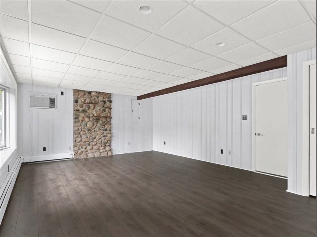 83 Joseph Road Framingham, MA 01701 - Photo 14 of 21 a view of an empty room with wooden floor