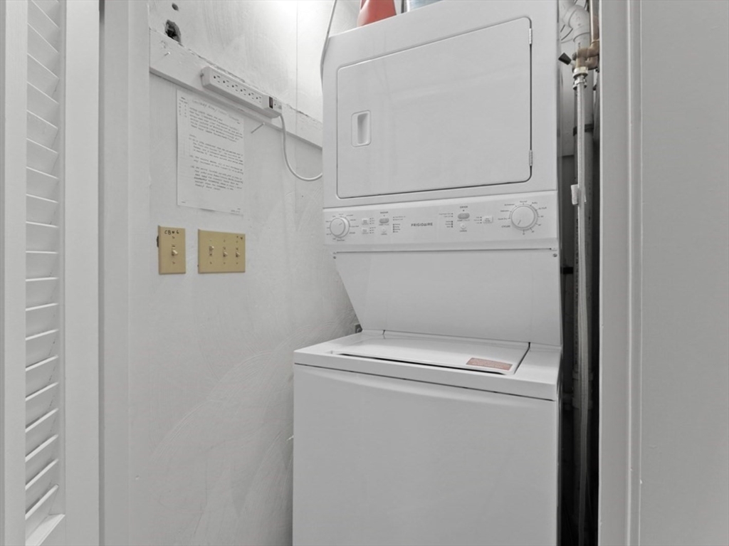 83 Joseph Road Framingham, MA 01701 - Photo 15 of 21 a utility room with dryer and washer