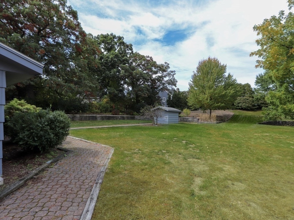 83 Joseph Road Framingham, MA 01701 - Photo 16 of 21 a view of a swimming pool with a yard