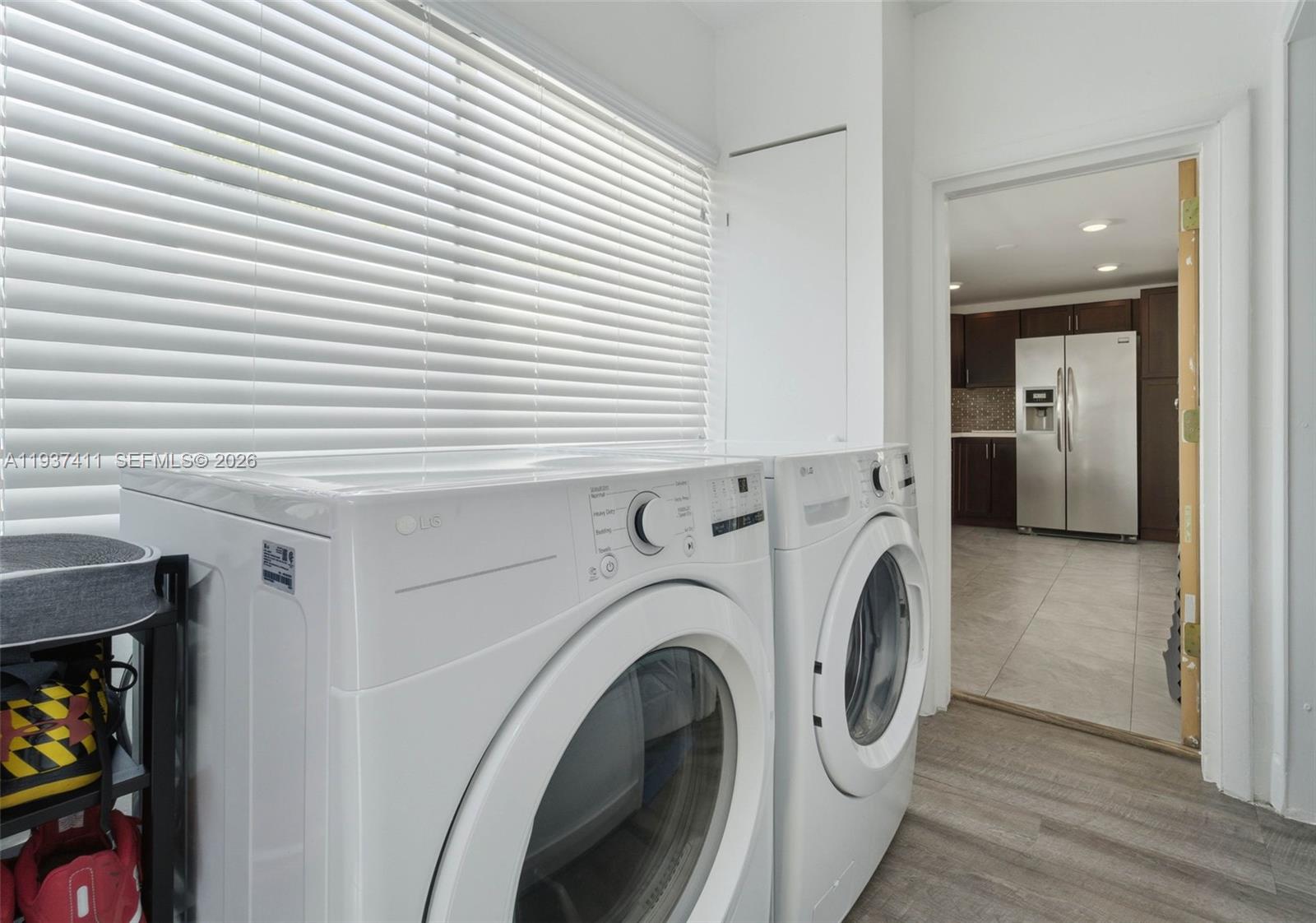 4420 Northwest 3rd Avenue Miami, FL 33127 - Photo 13 of 15 a view of a hallway with washer and dryer