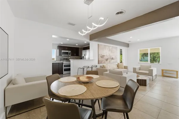 a view of a dining room with furniture