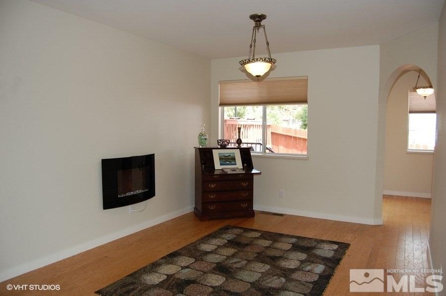 661 Tarn Way Reno, NV 89503 - Photo 8 of 24 a living room with furniture and a flat screen tv
