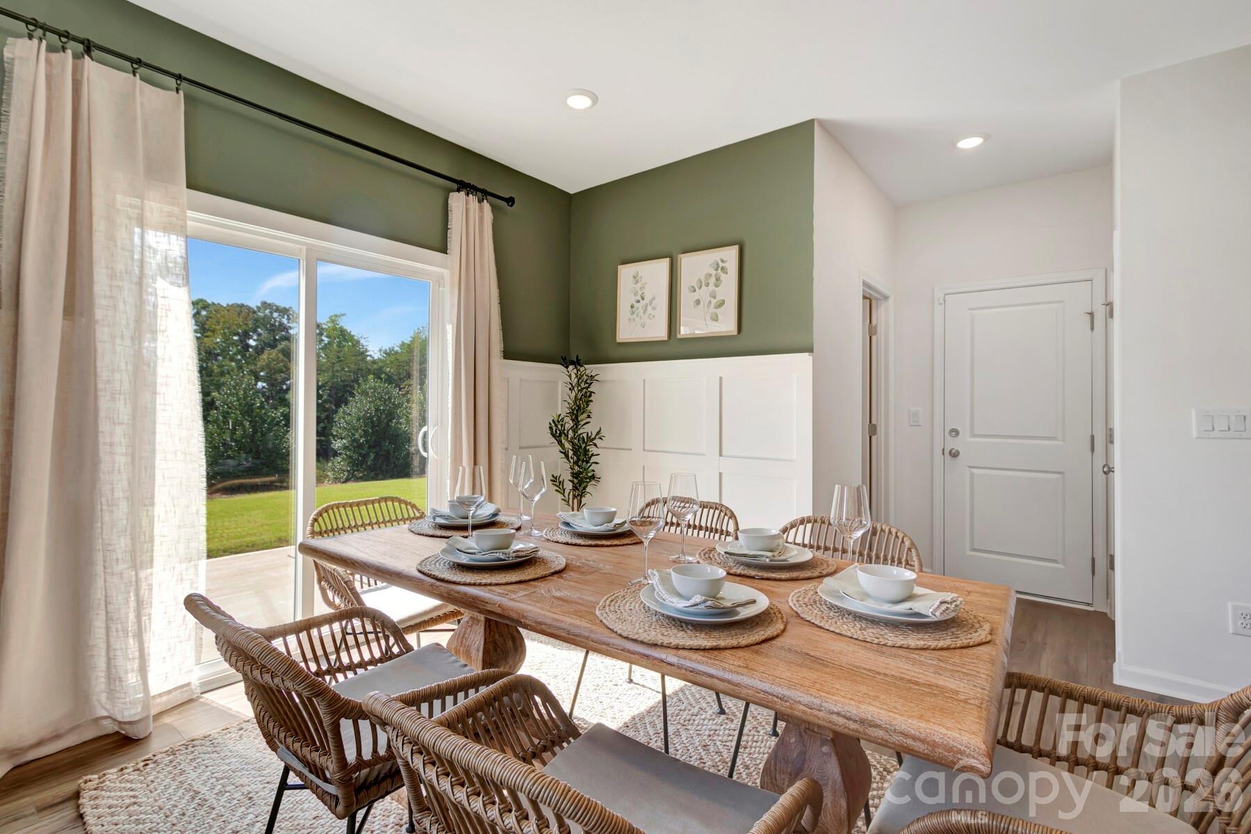 1452 Kate Cecil Way York, SC 29745 - Photo 12 of 27 a view of a dining room with furniture window and outside view