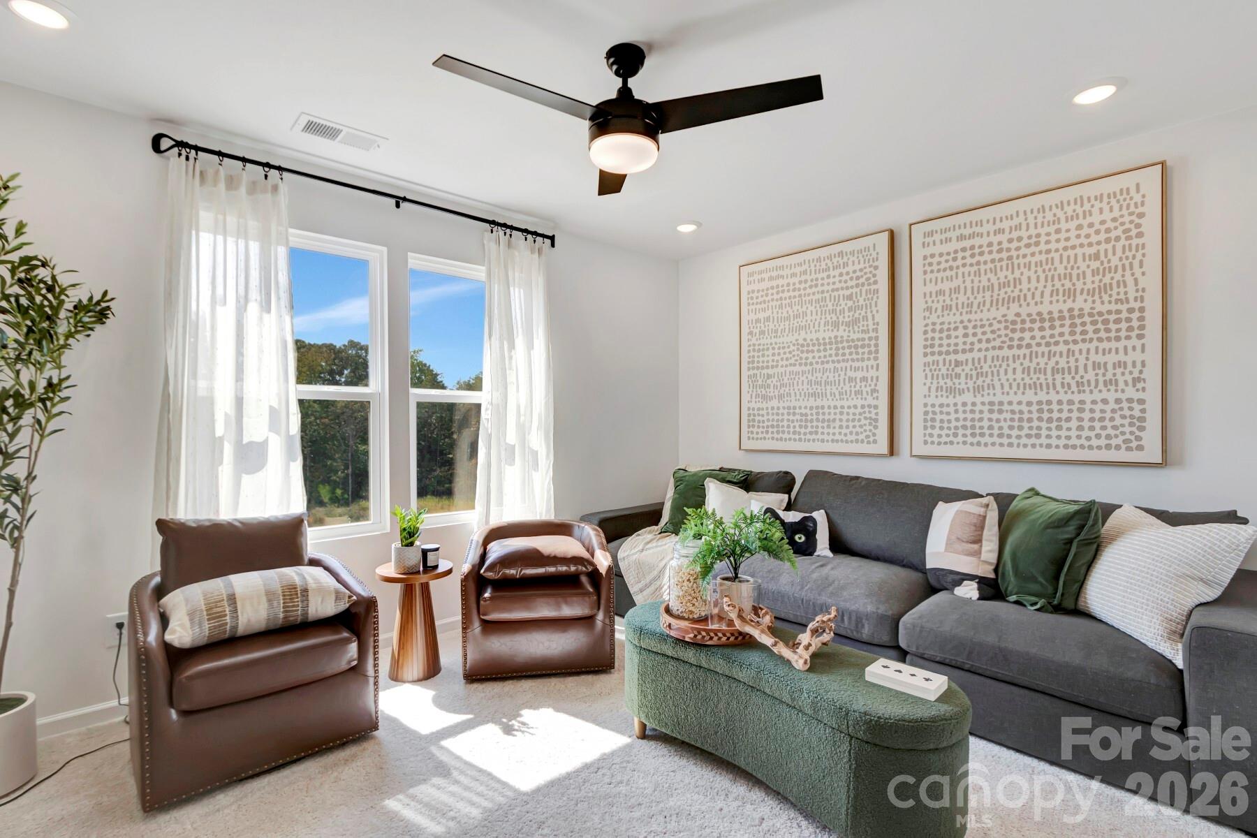 1452 Kate Cecil Way York, SC 29745 - Photo 13 of 27 a living room with furniture and a large window