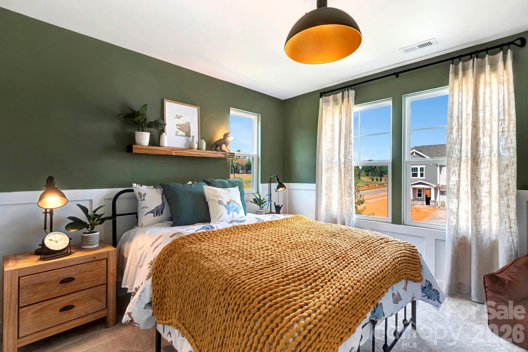 1452 Kate Cecil Way York, SC 29745 - Photo 16 of 27 a bedroom with a bed and window