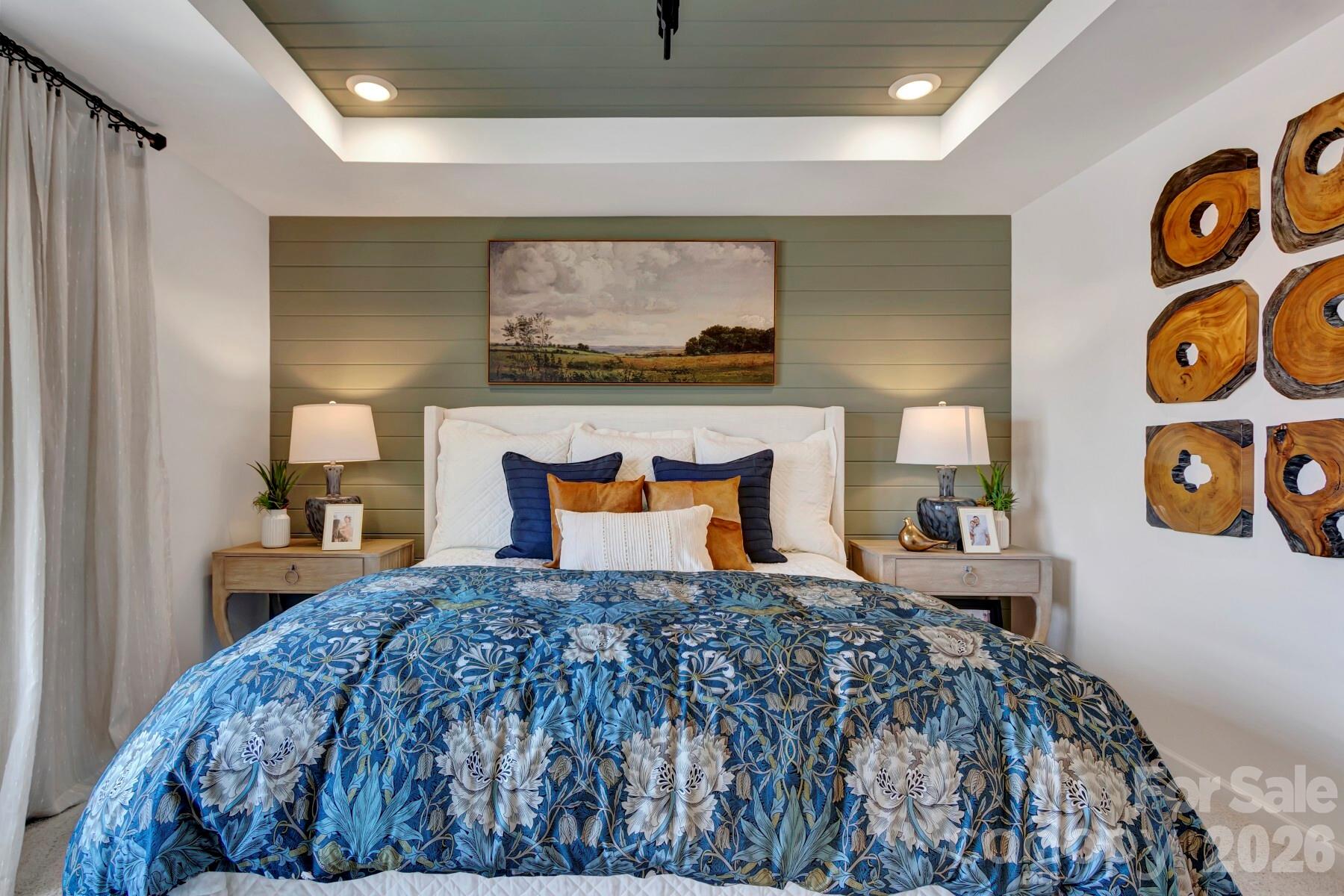 1452 Kate Cecil Way York, SC 29745 - Photo 22 of 27 a bedroom with a bed and painting on the wall