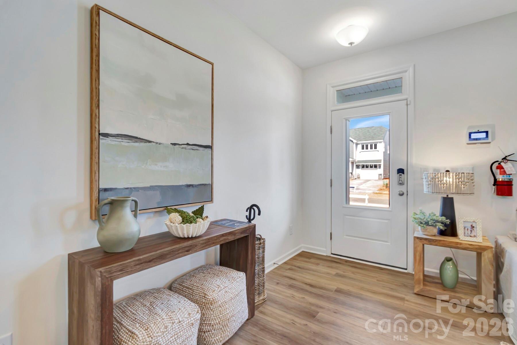 1452 Kate Cecil Way York, SC 29745 - Photo 3 of 27 a room with a table and a chair