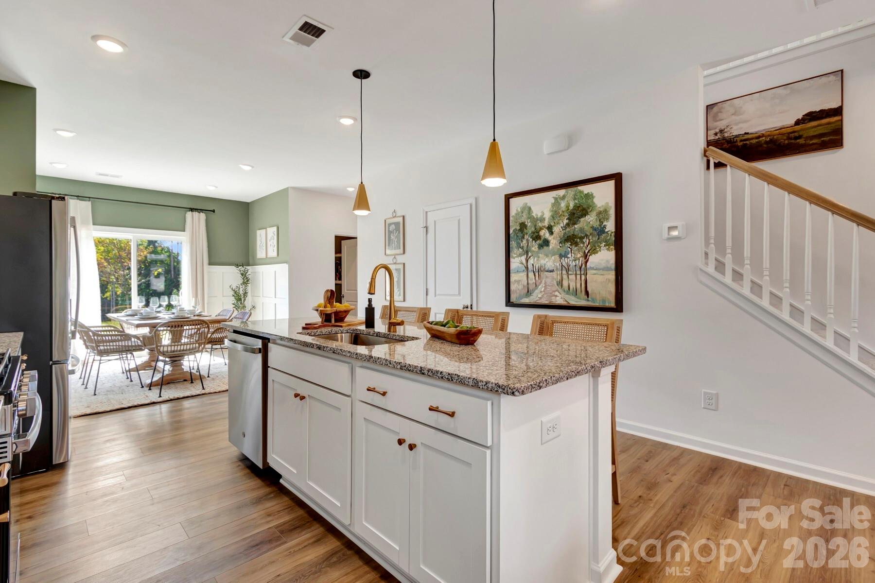1452 Kate Cecil Way York, SC 29745 - Photo 8 of 27 a view of a kitchen counter space and wooden floor
