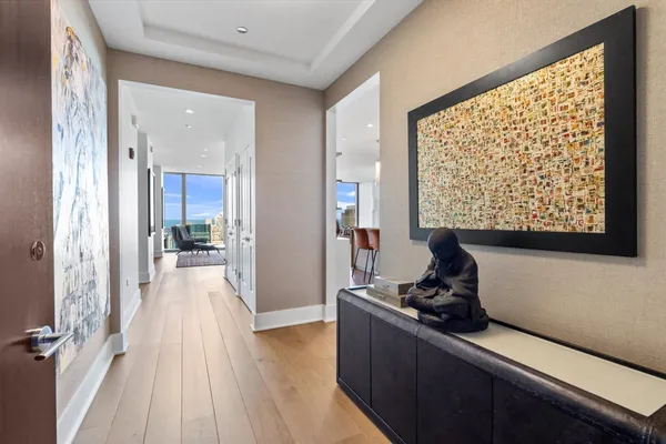a room with wooden floor and furniture