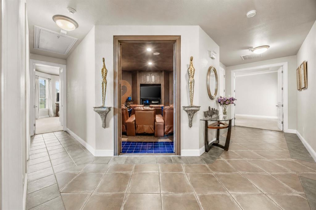 219 Mohundro Road Ferris, TX 75125 - Photo 24 of 40 a view of a livingroom with furniture and a hallway
