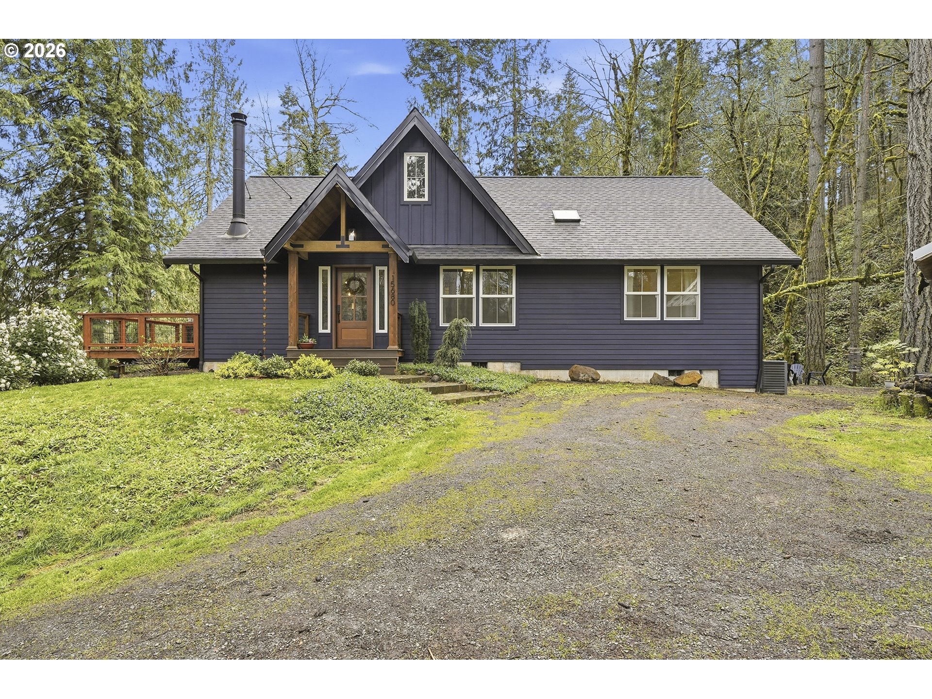 15680 South Wave Road Mulino, OR 97042 - Photo 1 of 43 a house view with a garden