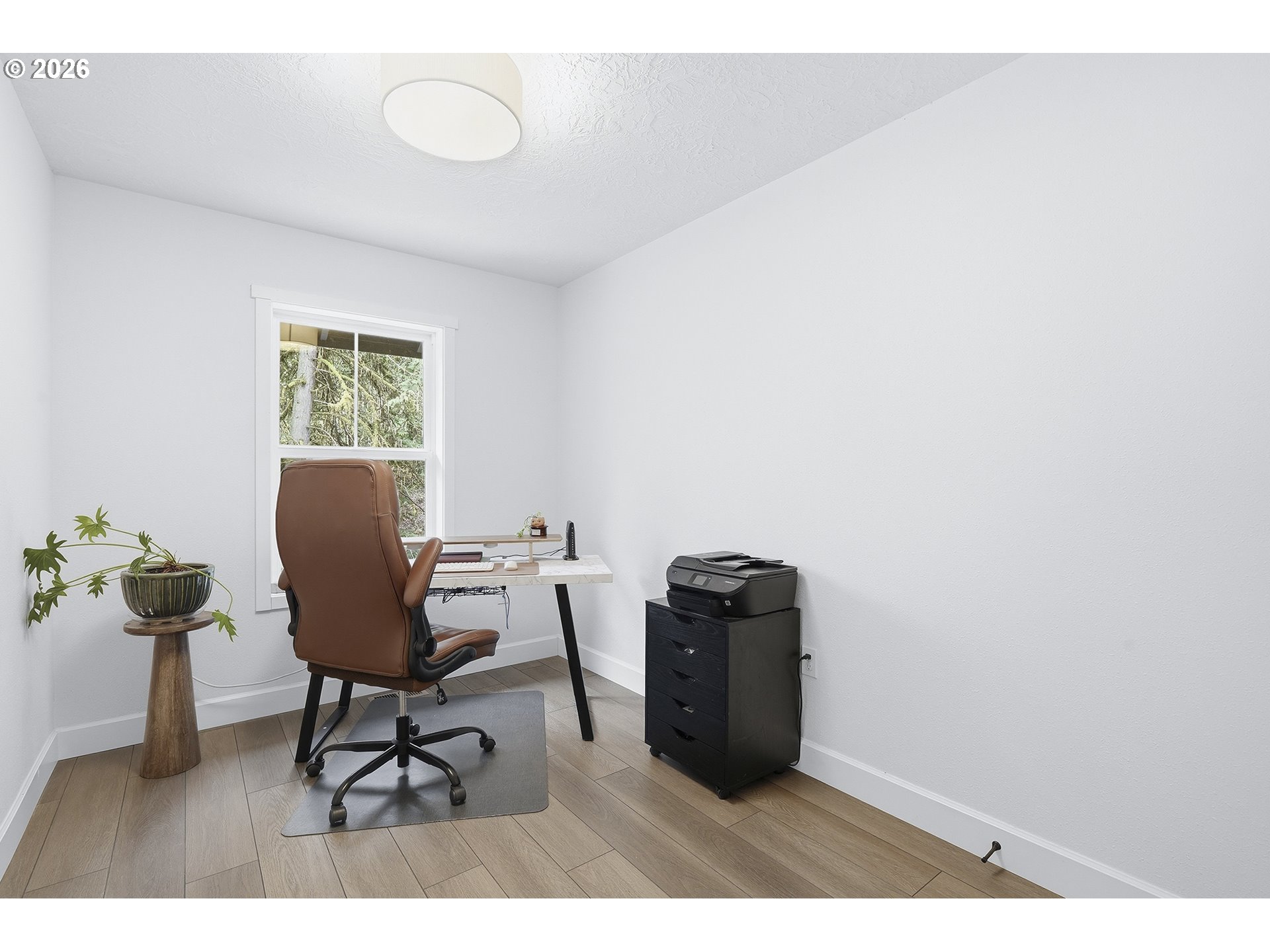 15680 South Wave Road Mulino, OR 97042 - Photo 14 of 43 a workspace room with furniture and a window