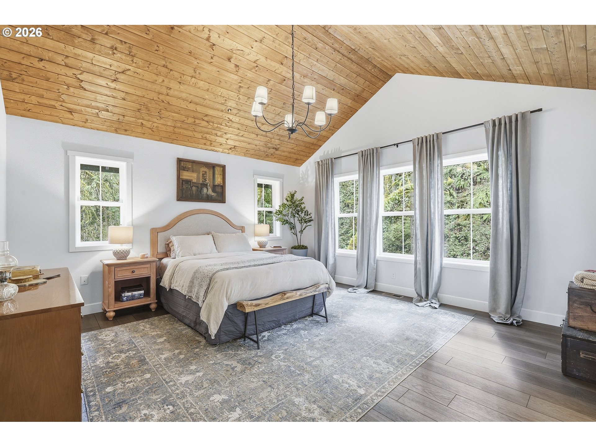 15680 South Wave Road Mulino, OR 97042 - Photo 19 of 43 a spacious bedroom with a large bed and a large window