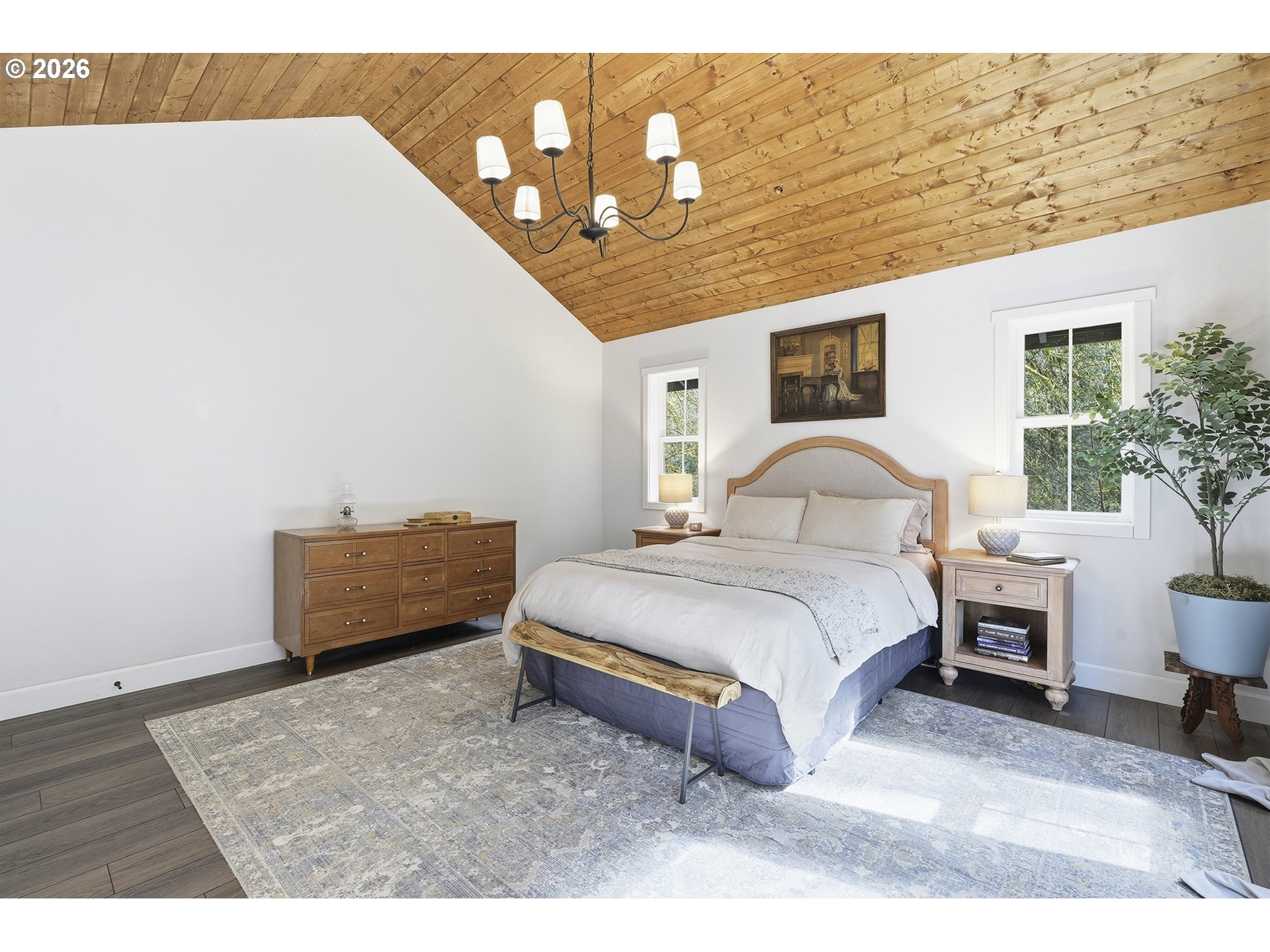 15680 South Wave Road Mulino, OR 97042 - Photo 20 of 43 a spacious bedroom with a bed a table and chair